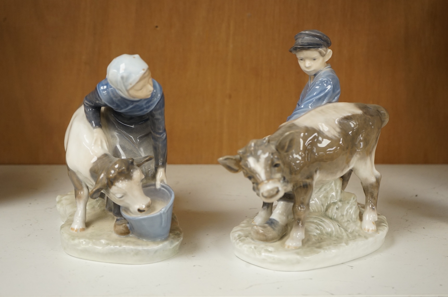 Two Royal Copenhagen porcelain figural groups, 20th century, 18cm wide